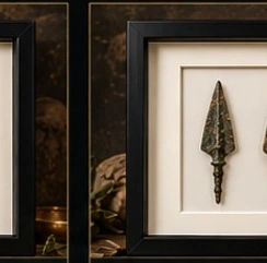 Illustrative framed pair of Greek bronze arrowheads